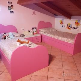 Coppia letti singoli con contenitore 