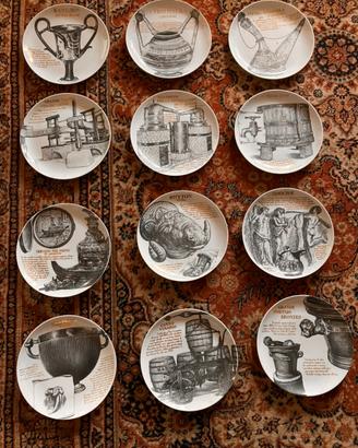 Set 12 pezzi piatti Fornasetti per Martini & Rossi