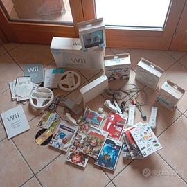 Nintendo Wii + giochi doppio controller volanti