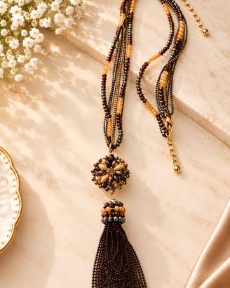 Stupenda collana lunga boho chic  con pendente flo