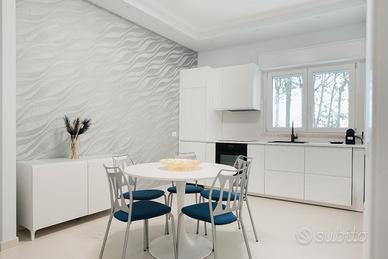Trilocale in villa centralissima con giardino