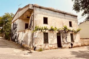 Casa con giardino di fronte a piazza Venezia