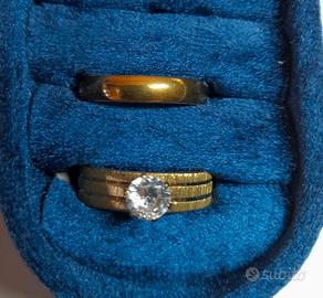 Set anello solitario e fede acciaio oro 18K