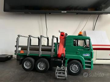 Bruder camion trasporto legname Man TGA