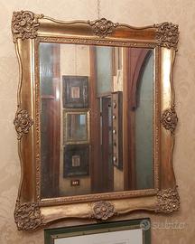 Antica specchiera dorata