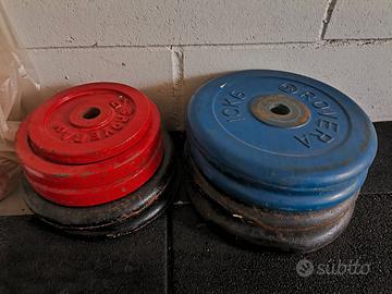 Bilanciere 10 Kg. e pesi in ghisa