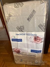 Materasso Lettino 60x125x14 e lettino con sbarre