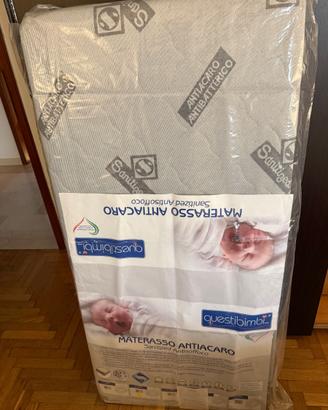 Materasso Lettino 60x125x14 e lettino con sbarre