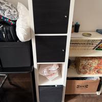 Due mobili Ikea Kallax con ante e contenitori
