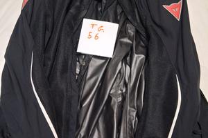 tuta Dainese spezzata 