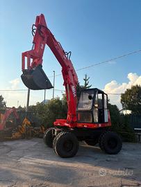 E142 - ESCAVATORE O&K MH4