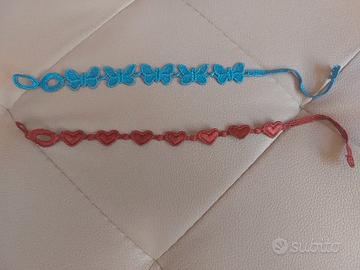 Quattro braccialetti in tessuto