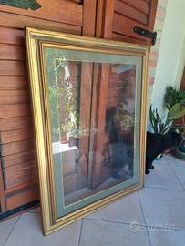 Cornice in legno dorato 90×70 cm