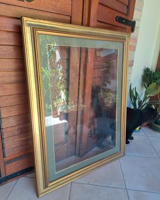 Cornice in legno dorato 90×70 cm
