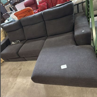 Divano con penisola reclainer in tessuto