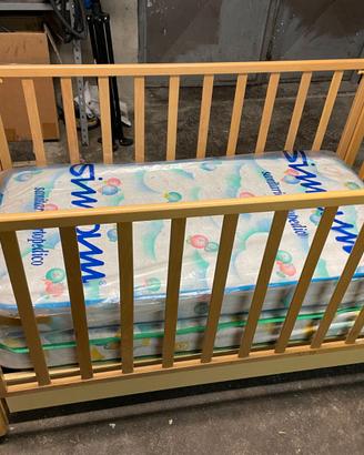 Lettino in legno per bambino/a + box in omaggio