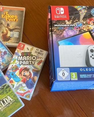 Nintendo Switch OLED Bianca + 4 giochi+ Scatola
