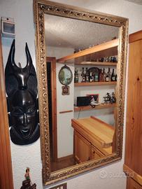 Specchio con cornice intersiata in legno
Dimension