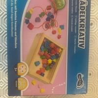 Gioco in legno  per creare collane o braccialetti