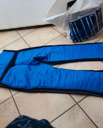 Tuta e scarponi da sci