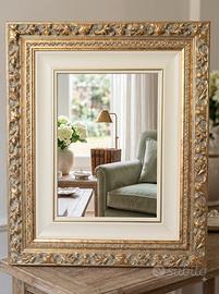 Splendida cornice in legno con finitura oro