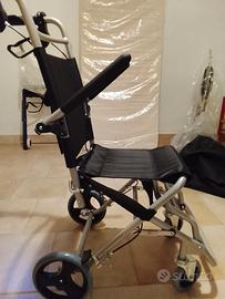 Sedia a rotelle, carrozzina pieghevole