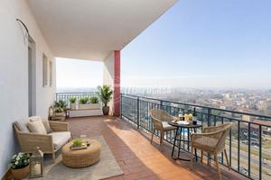 Splendido attico con terrazzo panoramico e posto a