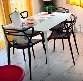 tavolo Bonaldo con sedie Kartell 