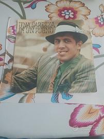 UNA CAREZZA IN UN PUGNO & AZZURRO 