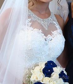Splendido e raffinato abito da sposa bianco