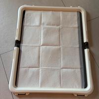 Supporto per tappetini igienici per cane