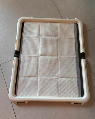 Supporto per tappetini igienici per cane