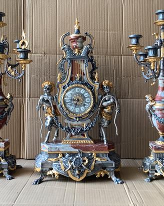 Trittico orologio e Candelabri oro argento 