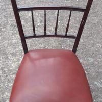 Sedia elegante da salotto in pelle e legno mogano