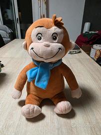 Peluche George scimmietta curiosa foulard azzurro
