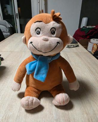 Peluche George scimmietta curiosa foulard azzurro