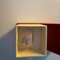 Anello rosa con stella marina e svarosky