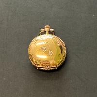 Orologio da tasca d’epoca in oro con coperchio