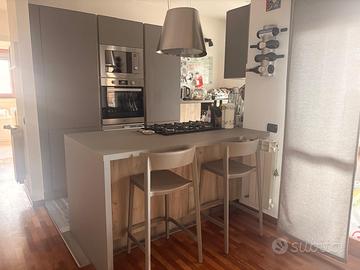 Cucina e parete attrezzata salotto Lube Immagina