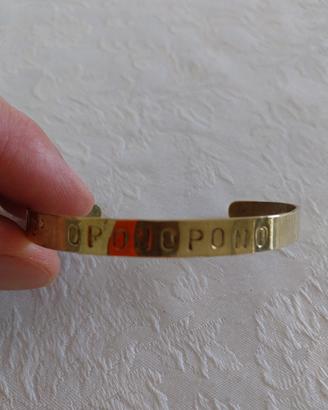 bracciali  ho' oponopono bronzo incisi a mano.