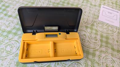 Caricabaterie per fotocamere Sony.