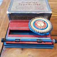 Antica macchina da scrivere in latta 