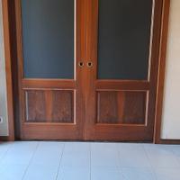 Porta scorrevole a doppia anta