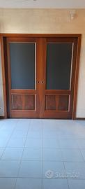 Porta scorrevole a doppia anta
