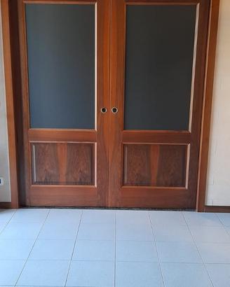 Porta scorrevole a doppia anta