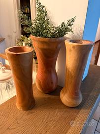 Tris di vasi in legno