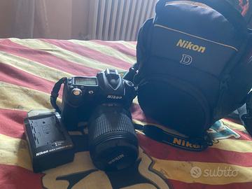 Macchina fotografica dikon 90
