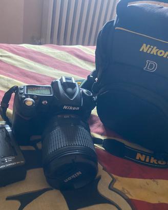 Macchina fotografica dikon 90