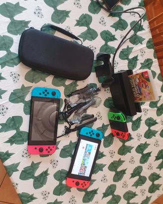 Doppia nintendo switch+giochi+accessori vari tv