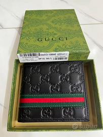 Portafoglio Gucci nero pelle GG a rilievo unisex